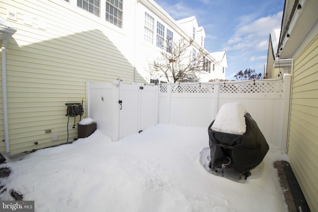 view of snow covered patio