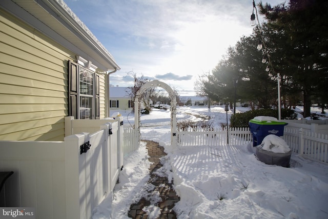 view of yard covered in snow