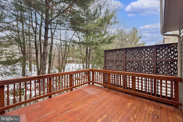 view of snow covered deck