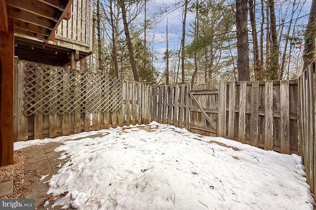 view of yard covered in snow