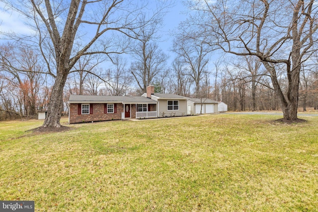 single story home featuring a front yard, a porch, brick siding, and a chimney