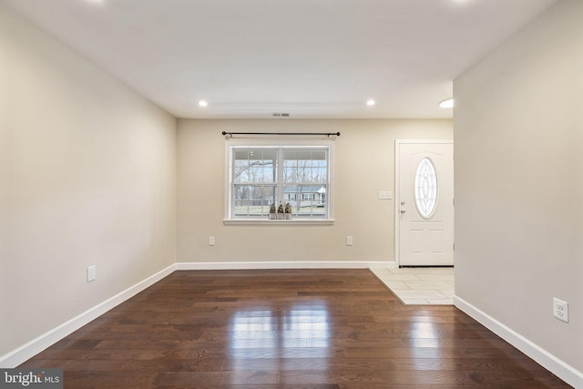 entrance foyer featuring visible vents, recessed lighting, wood finished floors, and baseboards