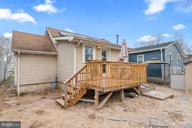 rear view of house with a deck