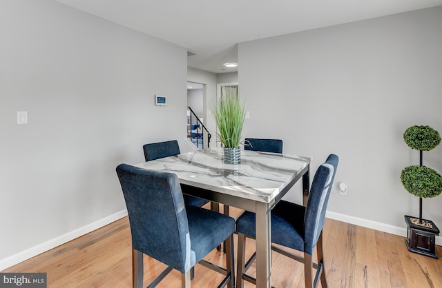 dining area featuring light hardwood / wood-style floors