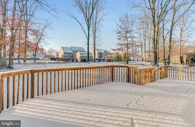 view of snow covered deck