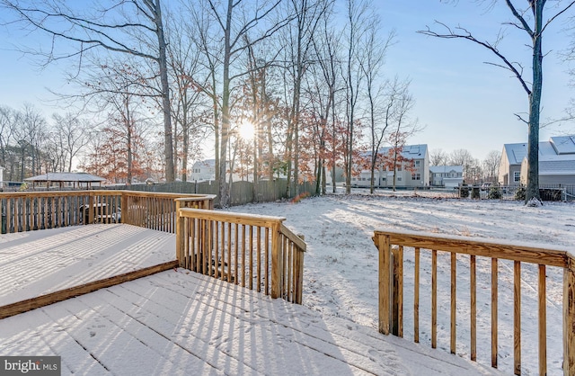 view of snow covered deck