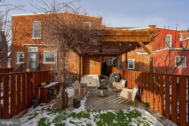 view of patio / terrace featuring ceiling fan and a pergola