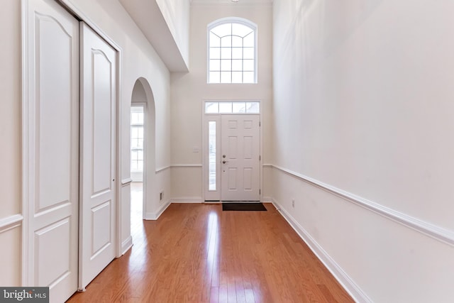 entryway with light hardwood / wood-style floors