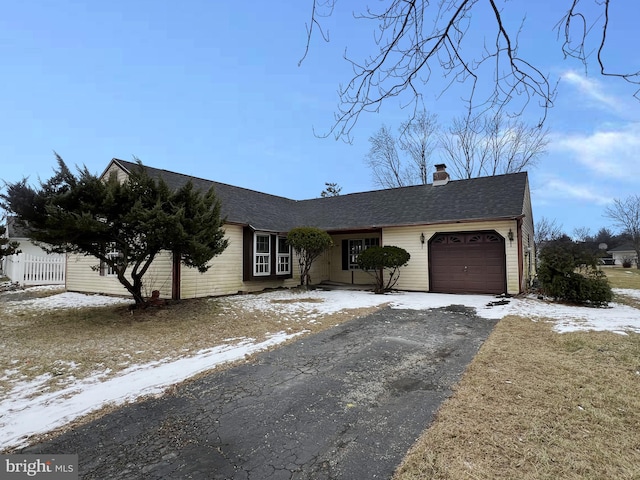 ranch-style house with a garage