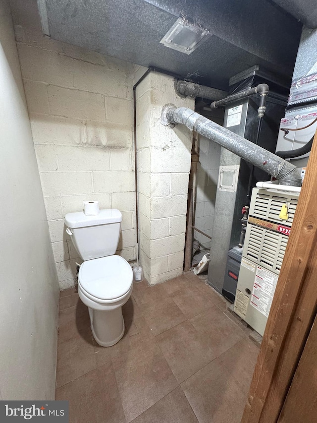 bathroom featuring toilet