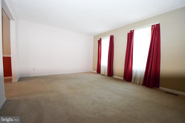 view of carpeted spare room