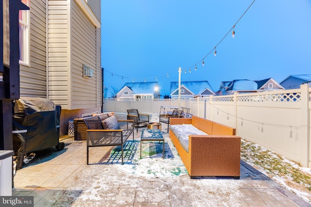 view of patio with outdoor lounge area and grilling area