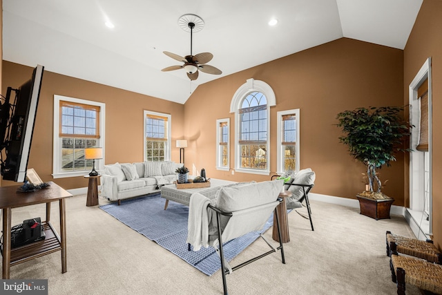 living room featuring light carpet, recessed lighting, baseboards, and vaulted ceiling