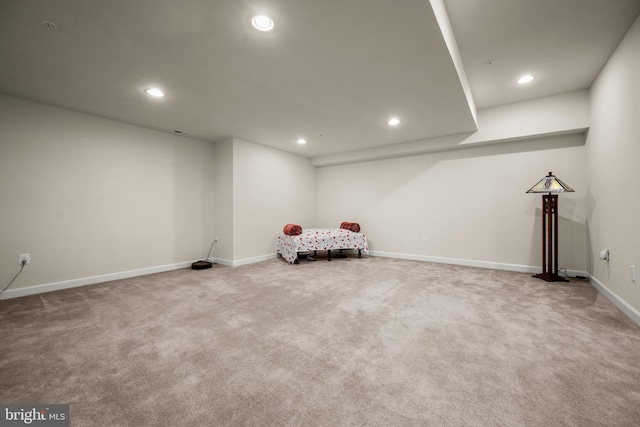 unfurnished room with recessed lighting, baseboards, and carpet flooring