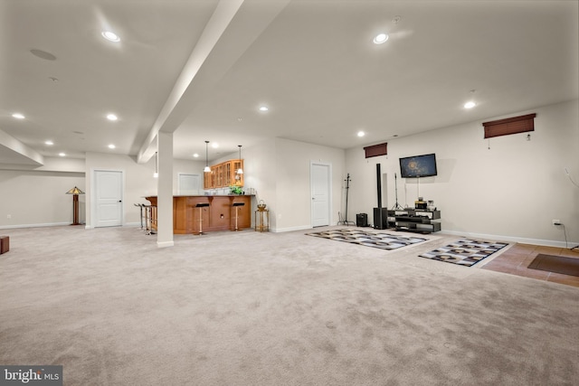 interior space featuring recessed lighting, light colored carpet, indoor bar, and baseboards