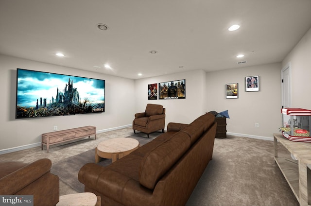 carpeted home theater room featuring visible vents, recessed lighting, and baseboards