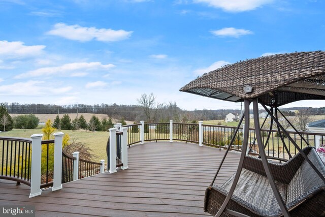 deck featuring a yard