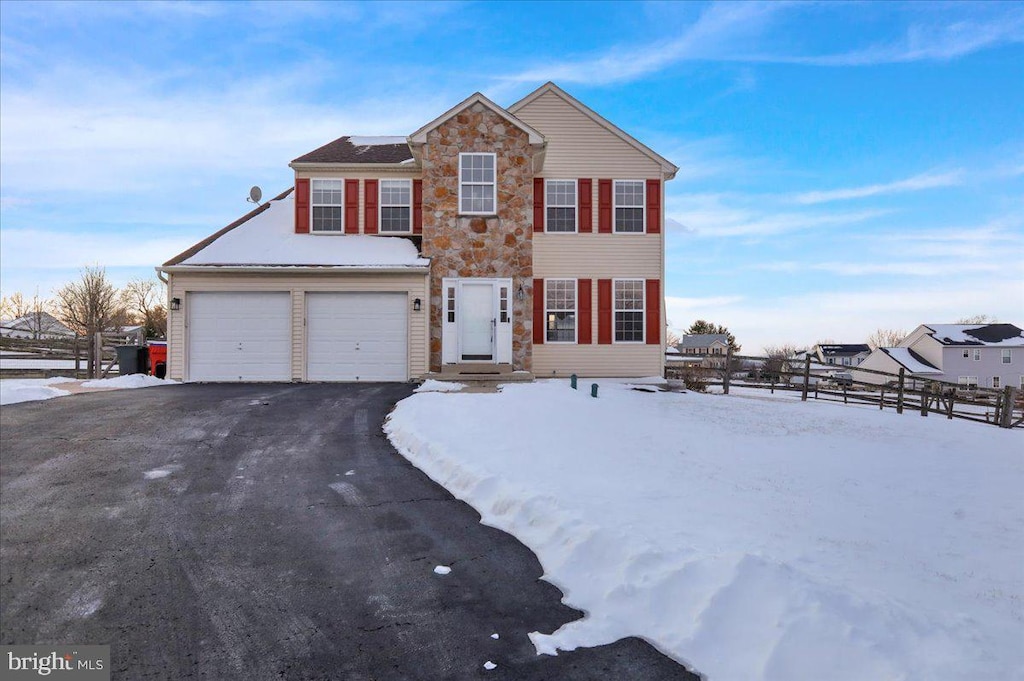 view of front of home featuring a garage