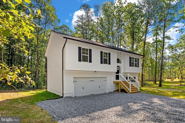 split foyer home featuring a garage