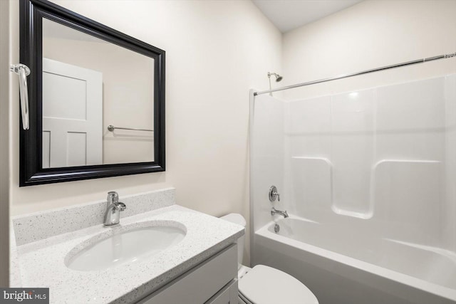 full bathroom featuring vanity, toilet, and bathtub / shower combination