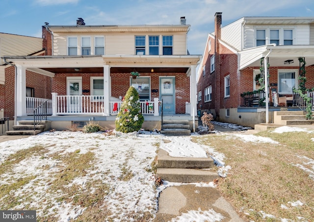 view of front of home featuring covered porch