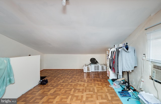 bonus room with parquet flooring