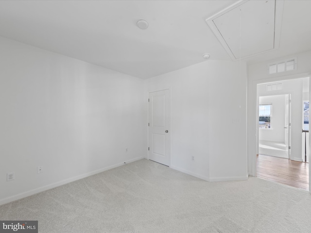 view of carpeted spare room