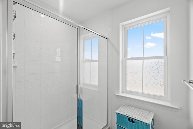 bathroom featuring walk in shower