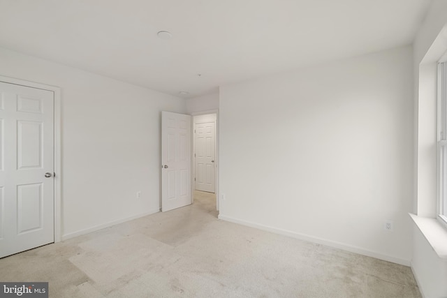 view of carpeted spare room