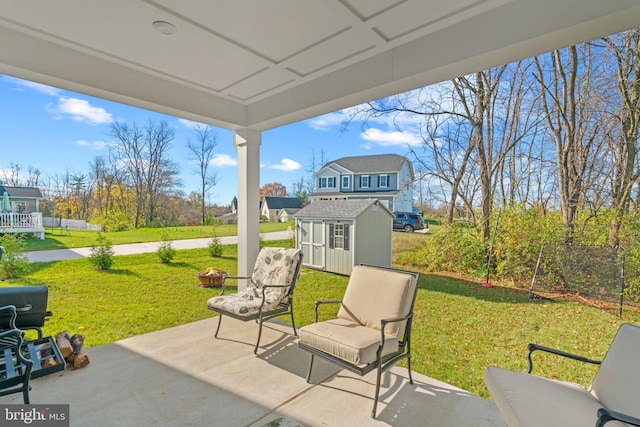 view of patio / terrace featuring a shed