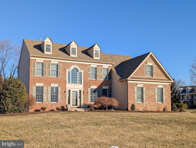 view of front of home featuring a front yard