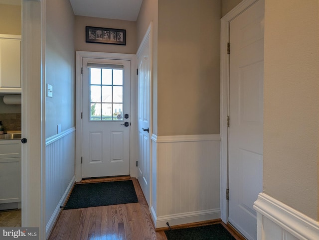 doorway with light hardwood / wood-style floors