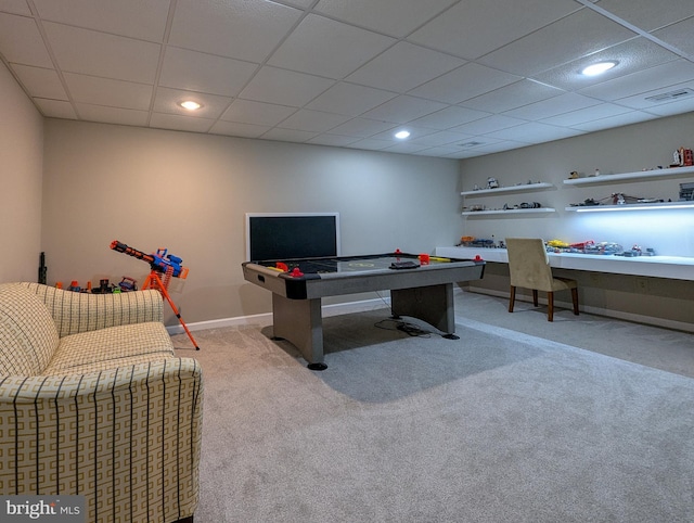 home office featuring a paneled ceiling and light colored carpet