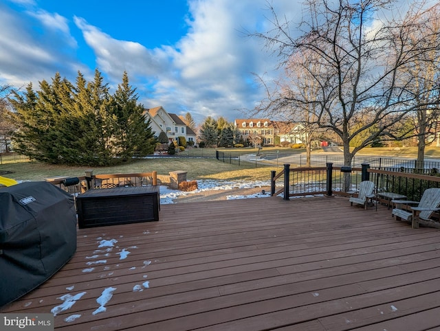 wooden deck with grilling area