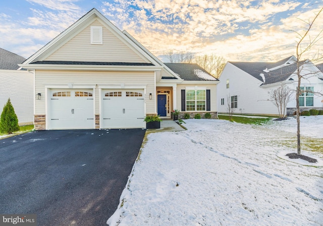 view of front of home with a garage