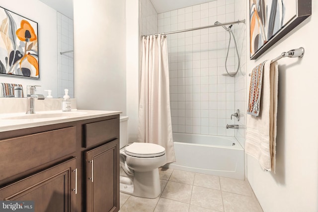 full bathroom featuring toilet, tile patterned flooring, shower / bath combo, and vanity