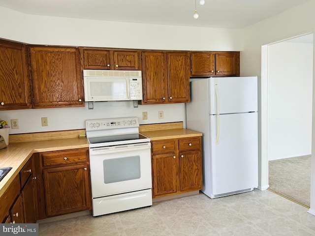 kitchen featuring white appliances