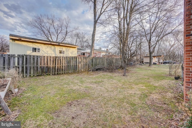 view of yard with fence