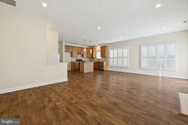 unfurnished living room with dark hardwood / wood-style flooring