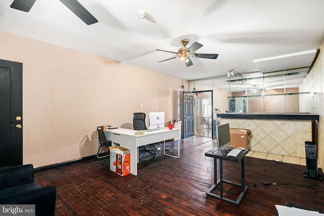 home office with hardwood / wood-style floors and ceiling fan