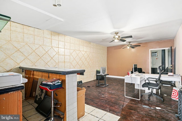 office featuring ceiling fan and tile patterned flooring