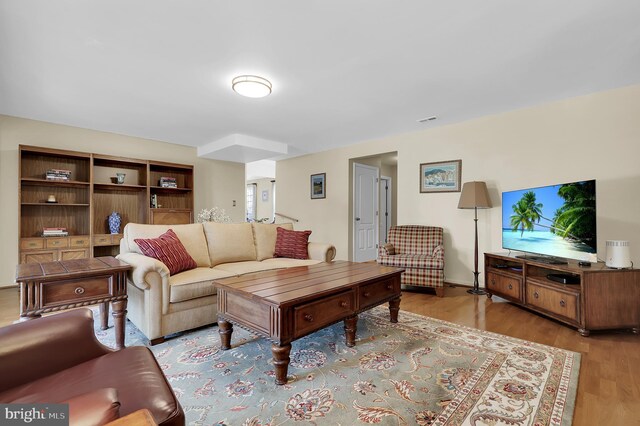 living room with light hardwood / wood-style floors