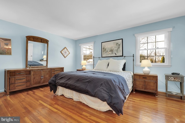 bedroom featuring light wood-type flooring