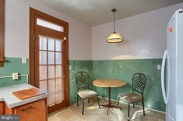 sitting room featuring light tile patterned floors