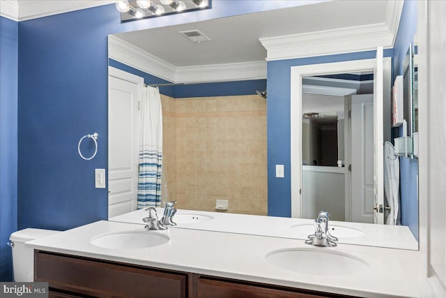 bathroom with crown molding, vanity, and curtained shower