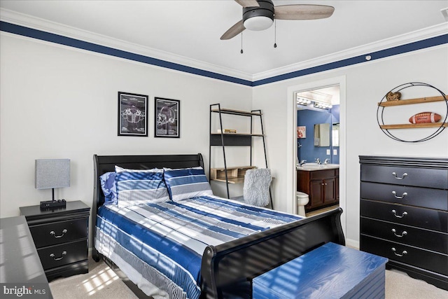 bedroom featuring ensuite bathroom, ceiling fan, crown molding, and light carpet