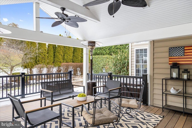 wooden terrace with ceiling fan