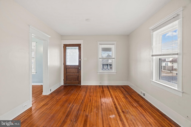 entrance foyer with hardwood / wood-style floors