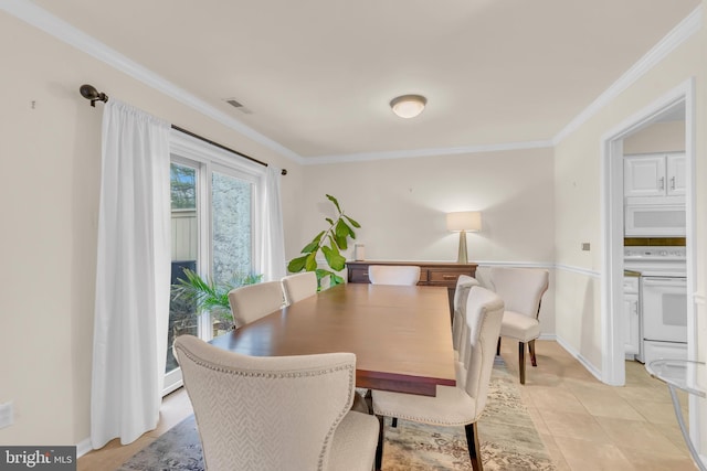 tiled dining area with ornamental molding