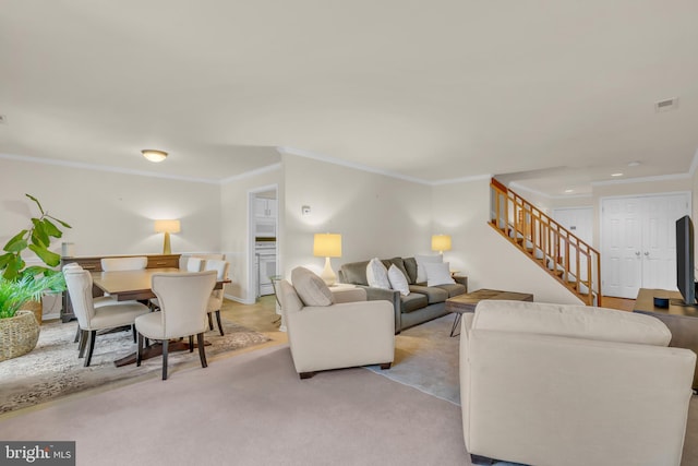 living room featuring light carpet and ornamental molding